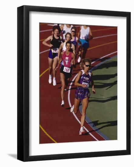 Female Runners Competing in a Track Race-null-Framed Photographic Print