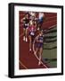 Female Runners Competing in a Track Race-null-Framed Photographic Print