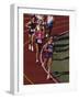 Female Runners Competing in a Track Race-null-Framed Photographic Print