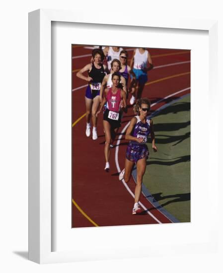 Female Runners Competing in a Track Race-null-Framed Photographic Print