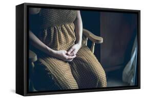 Female Sitting with Clasped Hands-Clive Nolan-Framed Stretched Canvas