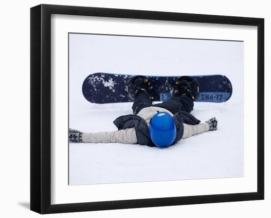 Female Snowboarder Collapsed after a Run, New York, USA-Paul Sutton-Framed Premium Photographic Print