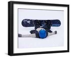 Female Snowboarder Collapsed after a Run, New York, USA-Paul Sutton-Framed Photographic Print
