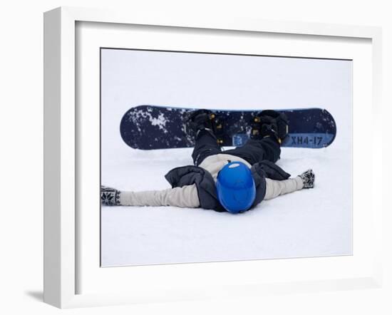 Female Snowboarder Collapsed after a Run, New York, USA-Paul Sutton-Framed Photographic Print