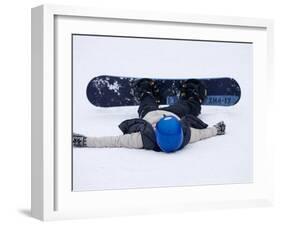Female Snowboarder Collapsed after a Run, New York, USA-Paul Sutton-Framed Photographic Print