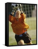 Female Soccer Goalie Catching the Ball-null-Framed Stretched Canvas