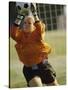 Female Soccer Goalie Catching the Ball-null-Stretched Canvas