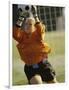 Female Soccer Goalie Catching the Ball-null-Framed Photographic Print