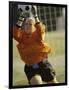 Female Soccer Goalie Catching the Ball-null-Framed Photographic Print