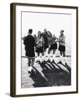 Female Soccer Team Standing in Front of Their Couch-null-Framed Photographic Print