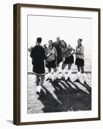 Female Soccer Team Standing in Front of Their Couch-null-Framed Photographic Print