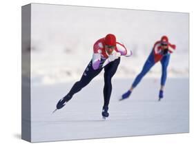 Female Speed Skaters in Action-null-Stretched Canvas