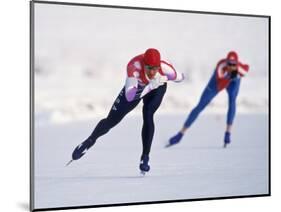 Female Speed Skaters in Action-null-Mounted Photographic Print