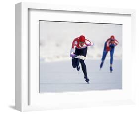 Female Speed Skaters in Action-null-Framed Photographic Print