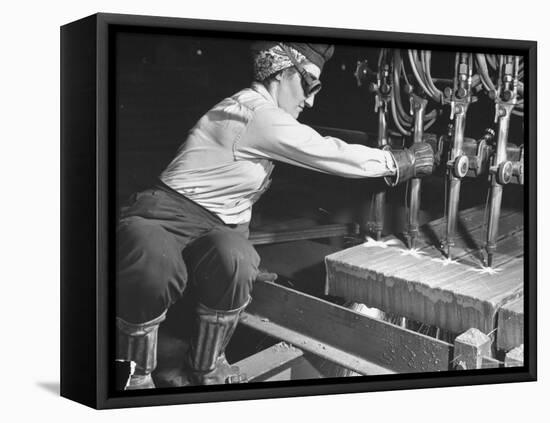 Female Steel Worker Operating Four Torch Machine to Cut Large Slab of Steel at Mill-Margaret Bourke-White-Framed Stretched Canvas
