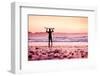 Female Surfer on the Beach at the Sunset-iko-Framed Photographic Print