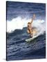 Female Surfer Riding a Wave-null-Stretched Canvas