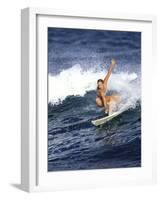 Female Surfer Riding a Wave-null-Framed Photographic Print