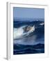 Female Surfer Riding a Wave-null-Framed Photographic Print