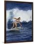 Female Surfer Riding a Wave-null-Framed Photographic Print