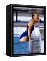 Female Swimmer Climbing Out of the Pool-null-Framed Stretched Canvas
