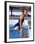 Female Swimmer Climbing Out of the Pool-null-Framed Photographic Print