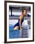 Female Swimmer Climbing Out of the Pool-null-Framed Photographic Print