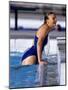 Female Swimmer Climbing Out of the Pool-null-Mounted Photographic Print