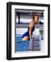 Female Swimmer Climbing Out of the Pool-null-Framed Photographic Print