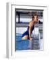 Female Swimmer Climbing Out of the Pool-null-Framed Photographic Print