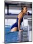 Female Swimmer Climbing Out of the Pool-null-Mounted Photographic Print