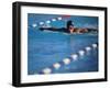 Female Swimmer Competing in a Butterfly Race-null-Framed Photographic Print