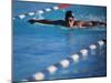 Female Swimmer Competing in a Butterfly Race-null-Mounted Photographic Print