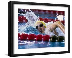 Female Swimmer Competing in a Race-null-Framed Photographic Print