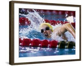 Female Swimmer Competing in a Race-null-Framed Photographic Print