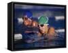 Female Swimmers Competing in a Breaststroke Race-null-Framed Stretched Canvas