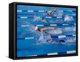 Female Swimmers Competing in a Freestyle Race-null-Framed Stretched Canvas