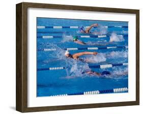 Female Swimmers Competing in a Freestyle Race-null-Framed Photographic Print