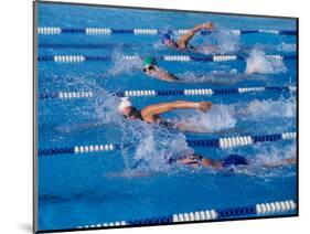 Female Swimmers Competing in a Freestyle Race-null-Mounted Photographic Print