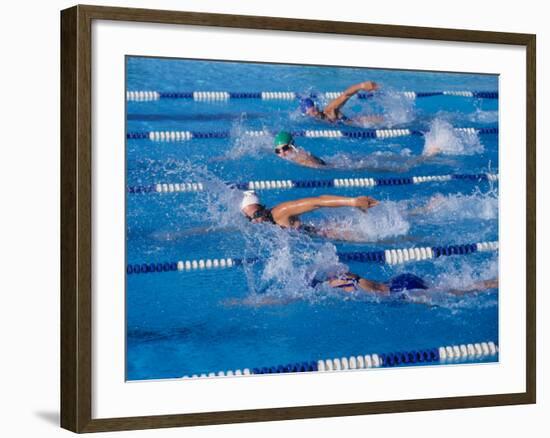 Female Swimmers Competing in a Freestyle Race-null-Framed Photographic Print