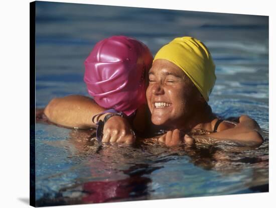 Female Swimmers Reacts to Victory-null-Stretched Canvas