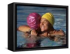 Female Swimmers Reacts to Victory-null-Framed Stretched Canvas