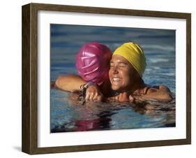 Female Swimmers Reacts to Victory-null-Framed Photographic Print