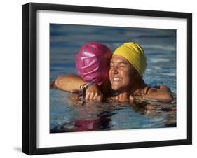 Female Swimmers Reacts to Victory-null-Framed Photographic Print