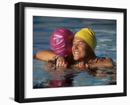 Female Swimmers Reacts to Victory-null-Framed Photographic Print