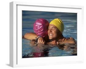 Female Swimmers Reacts to Victory-null-Framed Photographic Print