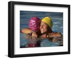 Female Swimmers Reacts to Victory-null-Framed Photographic Print