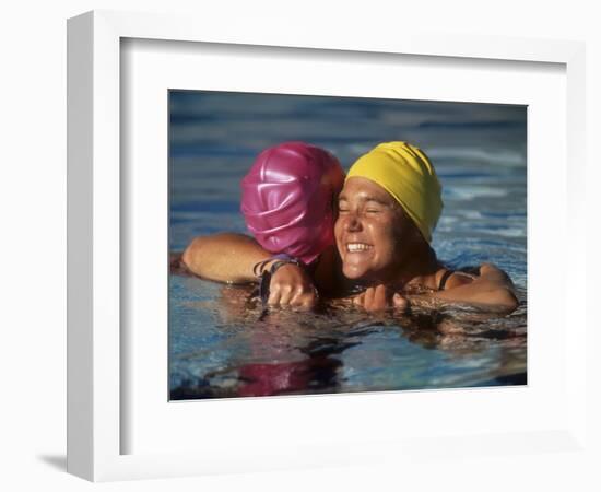 Female Swimmers Reacts to Victory-null-Framed Photographic Print