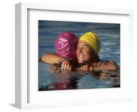 Female Swimmers Reacts to Victory-null-Framed Photographic Print