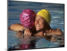 Female Swimmers Reacts to Victory-null-Mounted Photographic Print